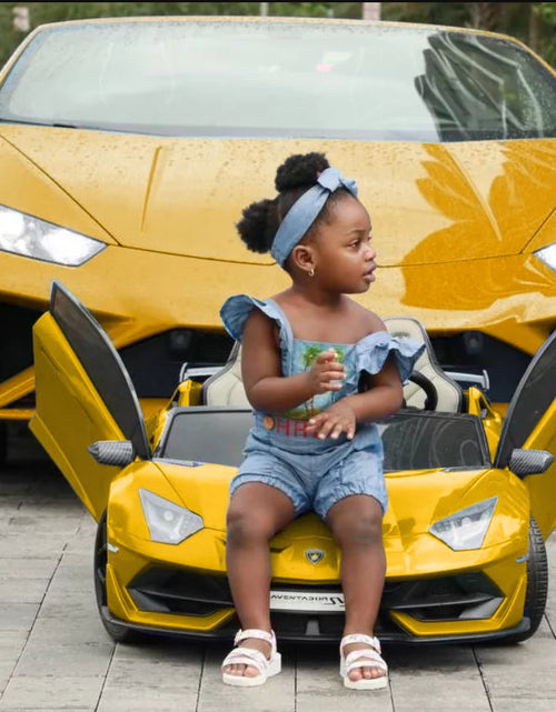 Load image into Gallery viewer, Lamborghini Aventador W/ Swappable Battery 24V - Electric Car for Kids with 3 Speeds, Leather Seat, Remote, MP3 Music by Bluetooth, FM Radio, Rubber Tires (Yellow)
